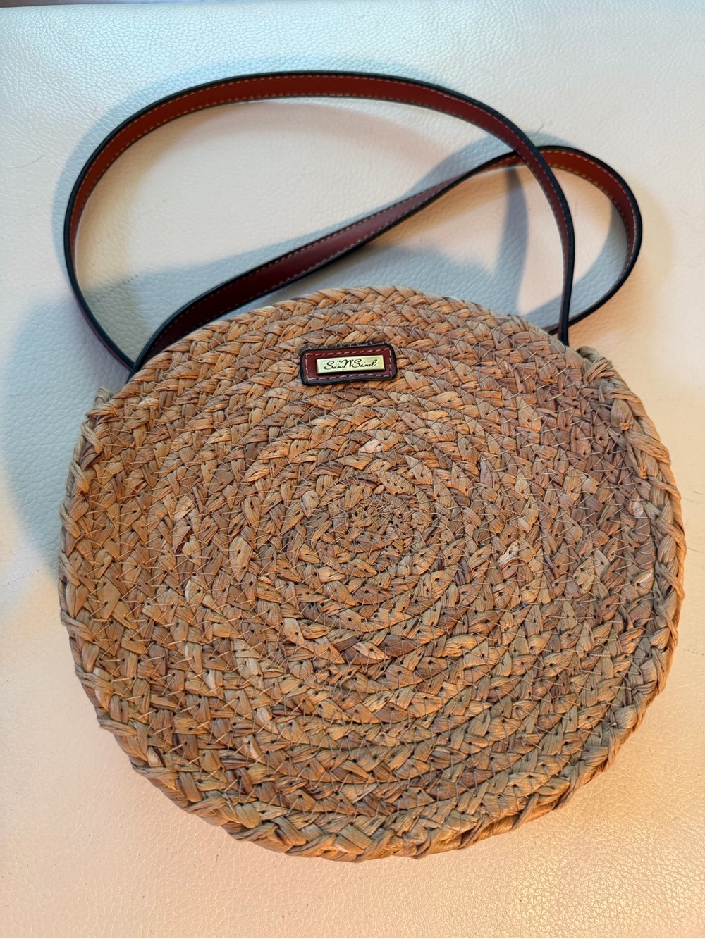 Sun and Sand Round Woven Straw Crossbody in Natural Tan with Brown Trim